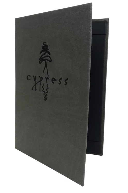 Cypress charcoal leatherette menu cover with hand-drawn ink logo